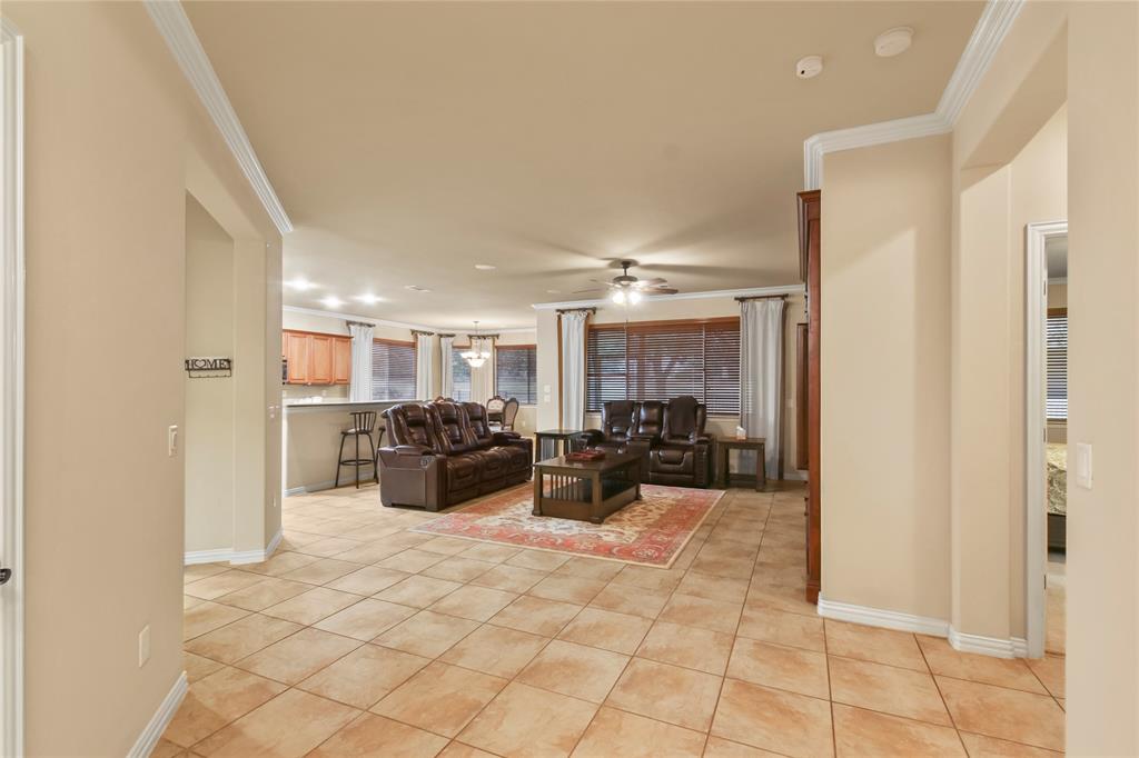 9116 Perimeter Street Denton, TX 76207 - Photo 5 of 26 a view of a lobby with couch
