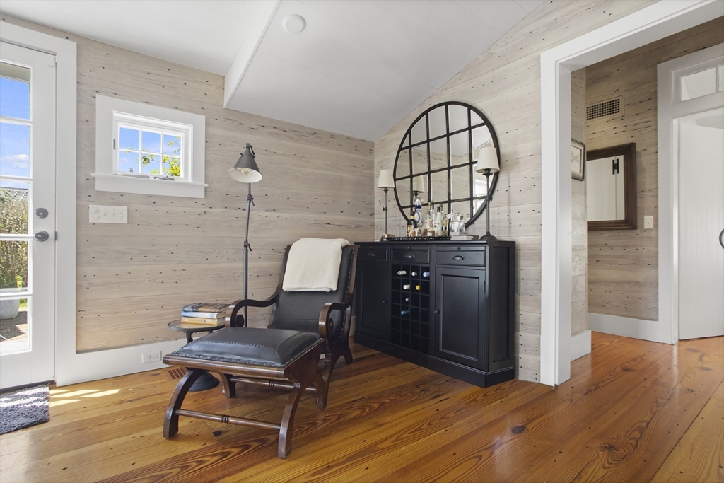 9 Lily Street Nantucket, MA 02554 - Photo 11 of 17 a view of a livingroom with furniture and wooden floor