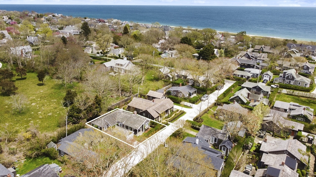 9 Lily Street Nantucket, MA 02554 - Photo 3 of 17 an aerial view of residential building with parking