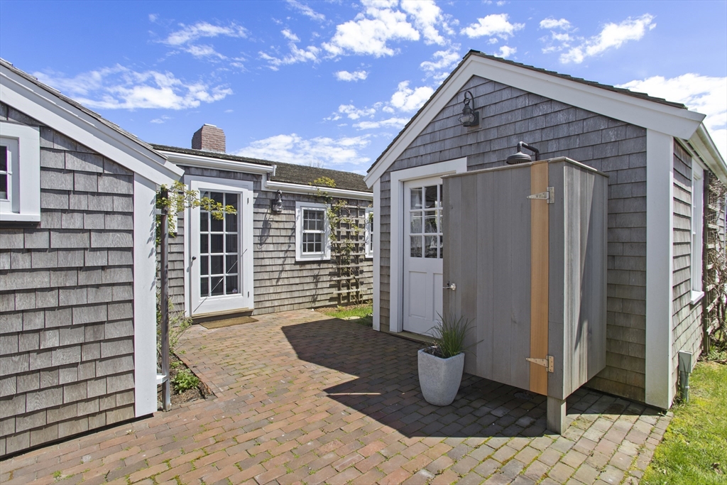 9 Lily Street Nantucket, MA 02554 - Photo 5 of 17 a front view of a house