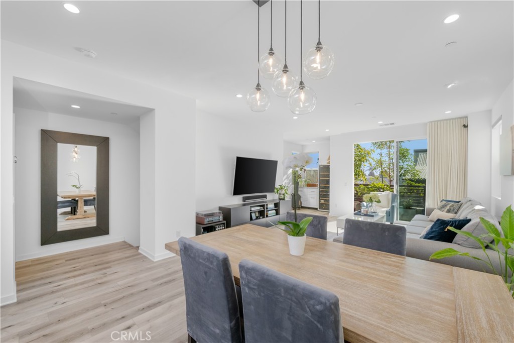 637 Cardiff Reef Costa Mesa, CA 92627 - Photo 12 of 27 a large kitchen with sink a counter top space and stainless steel appliances