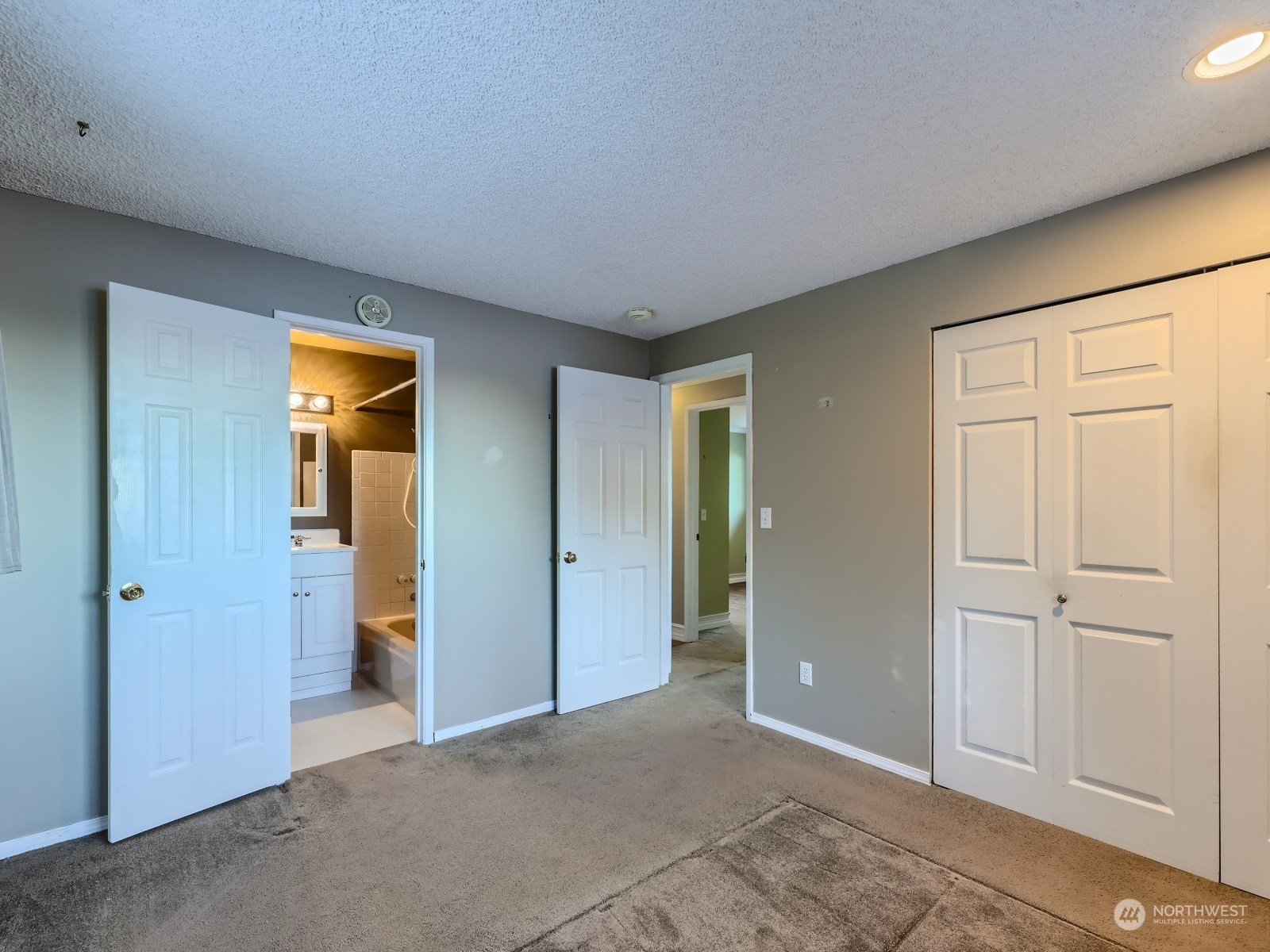 2730 Forest View Drive Everett, WA 98203 - Photo 11 of 28 an empty room with closet and wooden floor