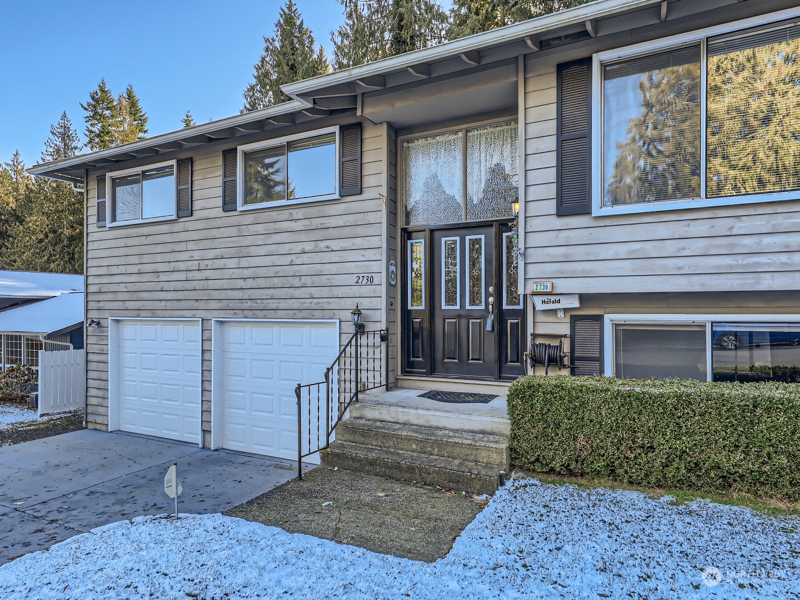 2730 Forest View Drive Everett, WA 98203 - Photo 3 of 28 a front view of a house with a yard