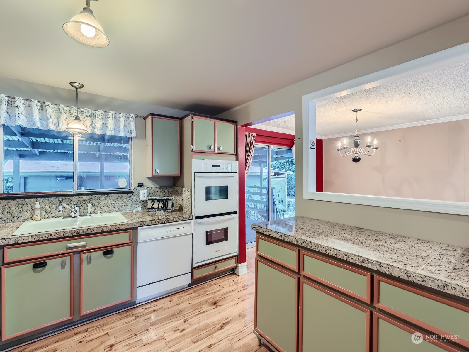 2730 Forest View Drive Everett, WA 98203 - Photo 8 of 28 a kitchen with stainless steel appliances granite countertop a sink and cabinets