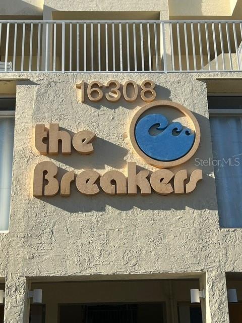 a kitchen with a stove a sink and a stove