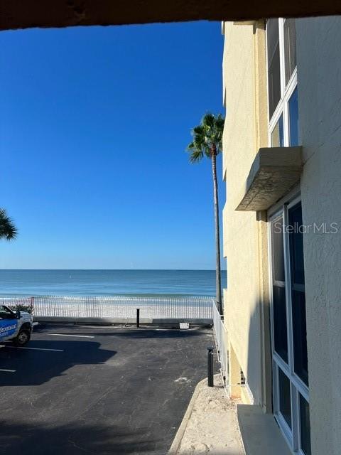 16308 Gulf Boulevard, Unit 103 Redington Beach, FL 33708 - Photo 16 of 23 a view of a living room with a fireplace and wooden floor