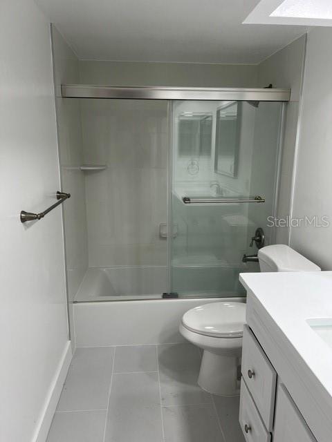 16308 Gulf Boulevard, Unit 103 Redington Beach, FL 33708 - Photo 9 of 23 a bathroom with a shower a toilet and sink