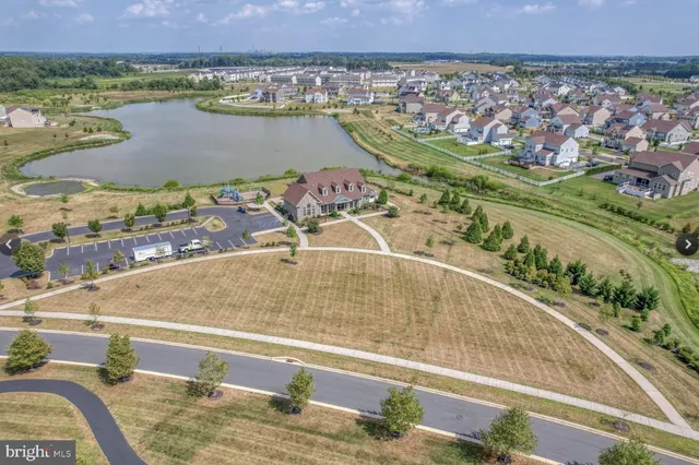 a view of a swimming pool with a lake view