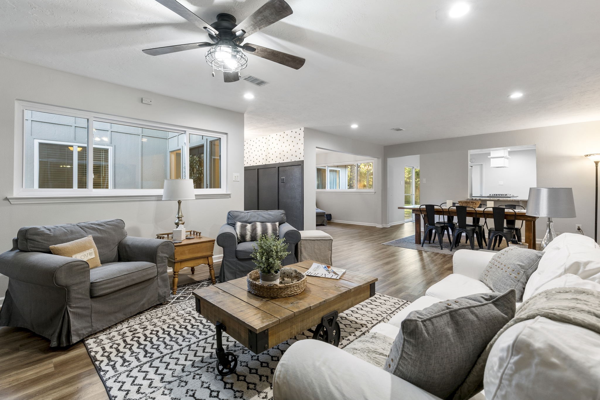 623 Hickory Ridge Drive Shenandoah, TX 77381 - Photo 17 of 26 a living room with furniture and a view of kitchen