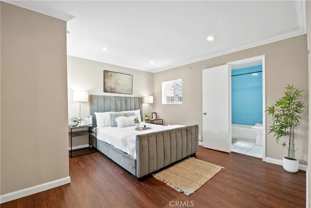 a bed room with a bed and a window