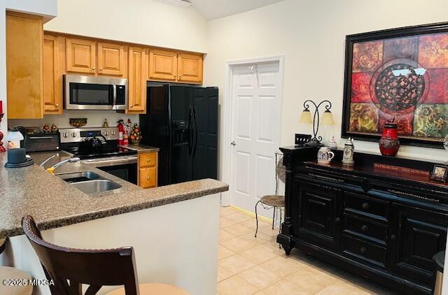 1402 Cottage Hill Drive Macon, GA 31210 - Photo 12 of 27 a kitchen with a appliances and cabinets