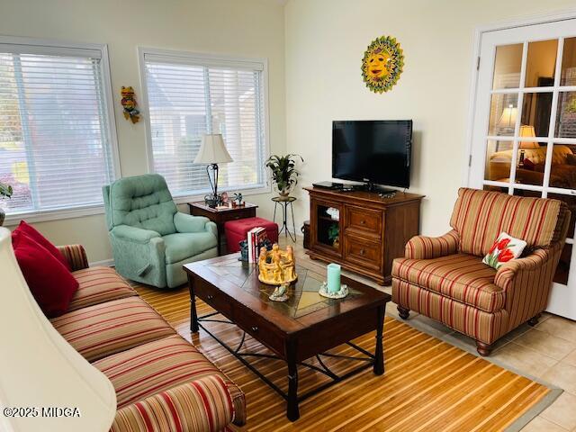 1402 Cottage Hill Drive Macon, GA 31210 - Photo 15 of 27 a living room with furniture and a flat screen tv