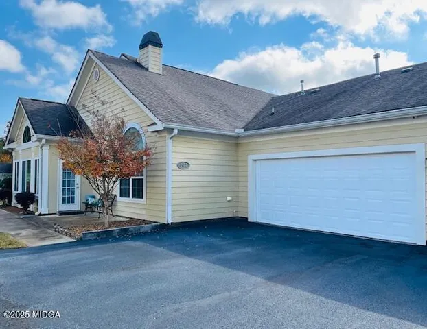 a front view of house with yard