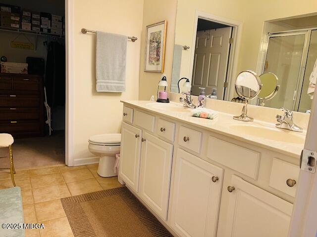 1402 Cottage Hill Drive Macon, GA 31210 - Photo 22 of 27 a bathroom with a double vanity sink and a mirror