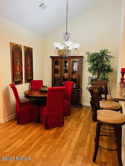 1402 Cottage Hill Drive Macon, GA 31210 - Photo 9 of 27 a view of a livingroom with furniture and a chandelier