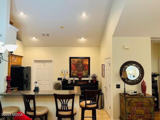 1402 Cottage Hill Drive Macon, GA 31210 - Photo 10 of 27 a living room with furniture and a flat screen tv
