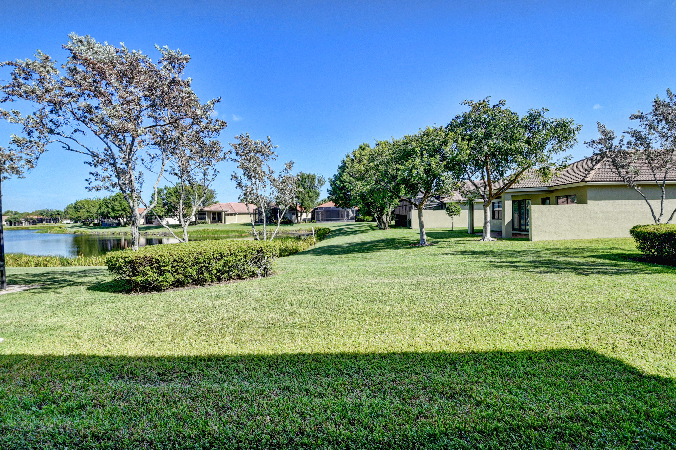 9583 Isles Cay Drive Delray Beach, FL 33446 - Photo 29 of 47 Rear of Home