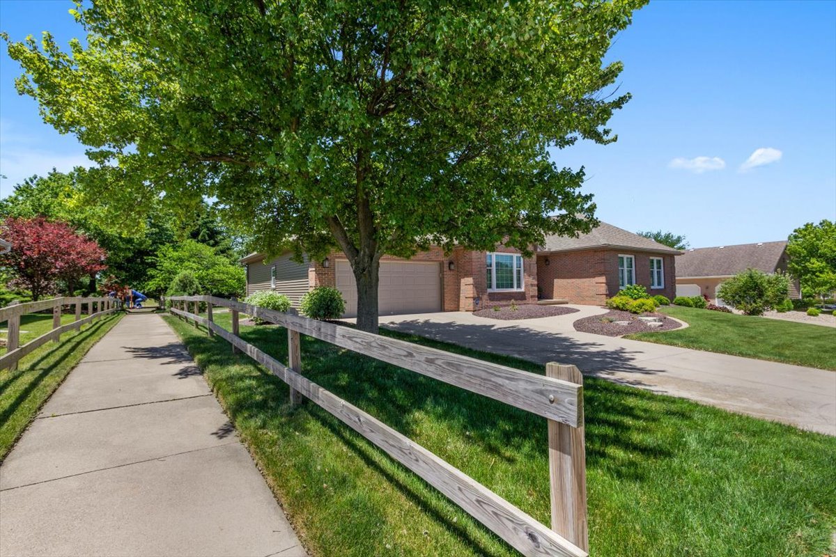 22 Barley Circle Bloomington, IL 61704 - Photo 25 of 30 a front view of a house with a yard