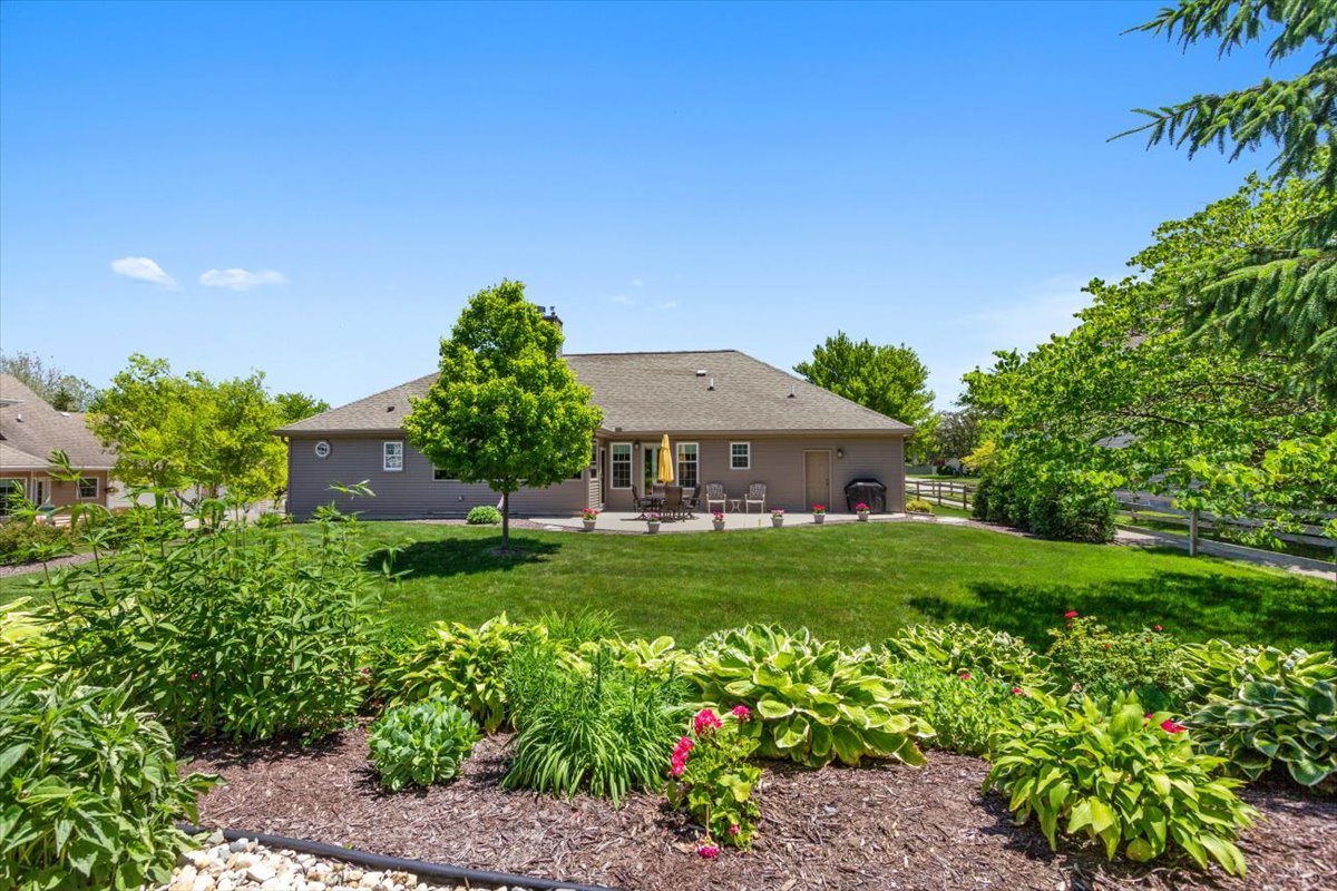 22 Barley Circle Bloomington, IL 61704 - Photo 3 of 30 a view of a house with a garden