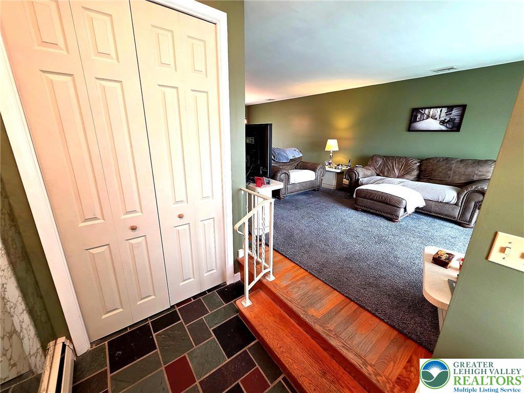 327 Sumner Avenue Whitehall, PA 18052 - Photo 11 of 38 a living room with furniture and a rug