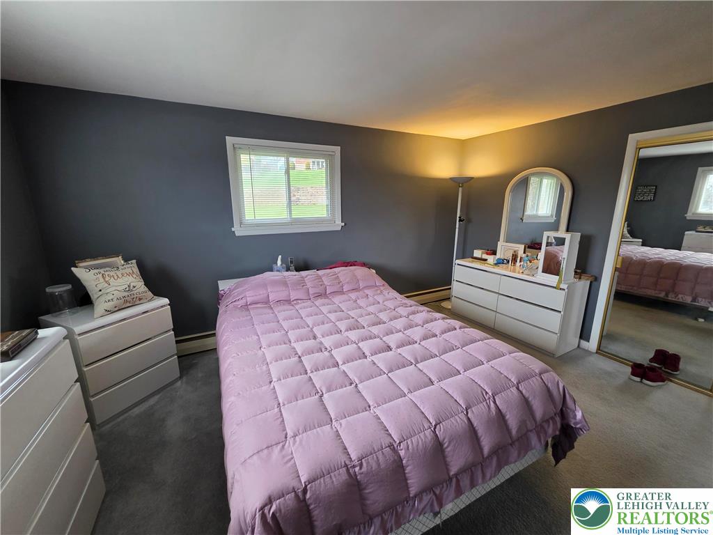 327 Sumner Avenue Whitehall, PA 18052 - Photo 28 of 38 a bedroom with a bed and a dresser