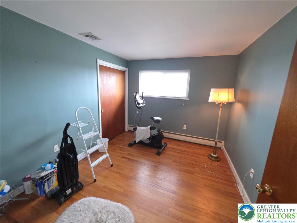 327 Sumner Avenue Whitehall, PA 18052 - Photo 32 of 38 a room with furniture and a window