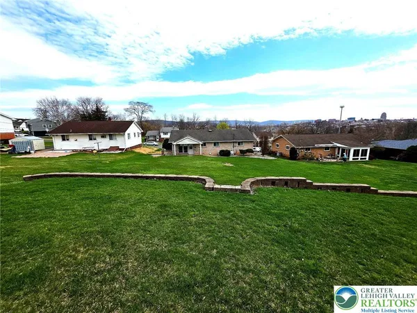 a view of a golf course with a garden
