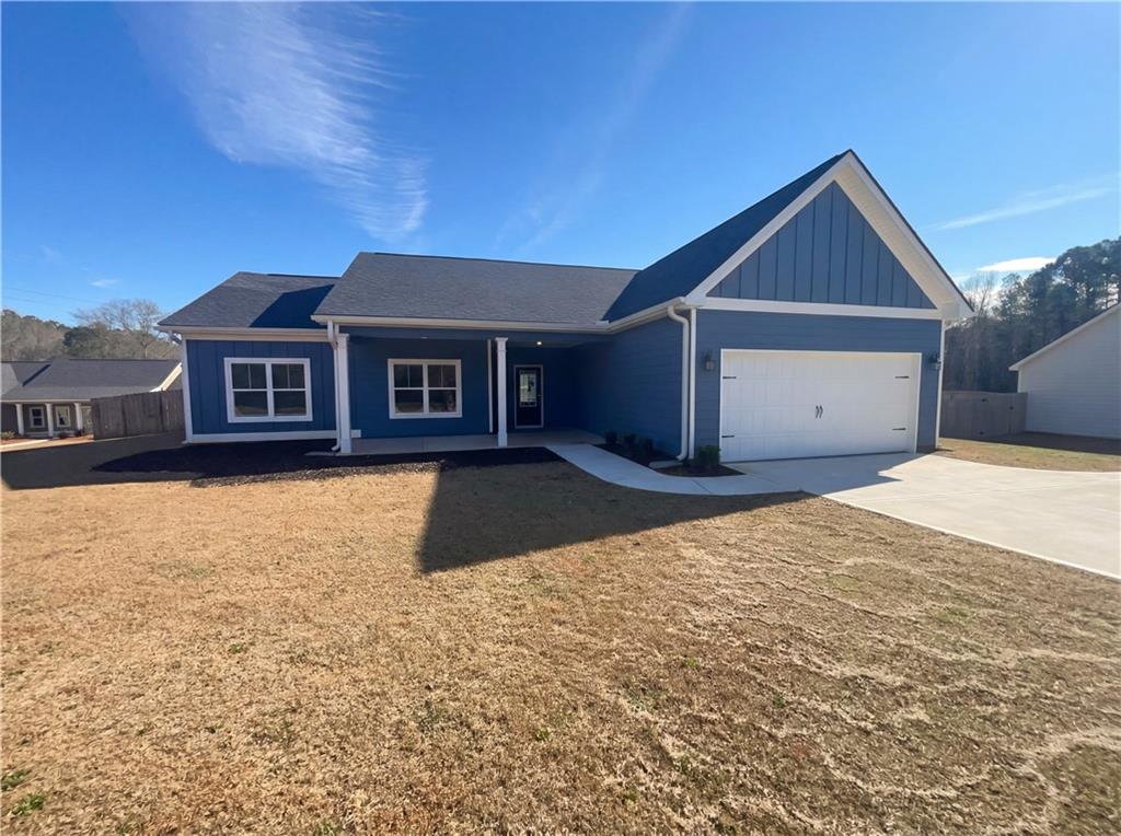 104 Charlie Fuller Road Grantville, GA 30220 - Photo 12 of 19 front view of a house with a yard