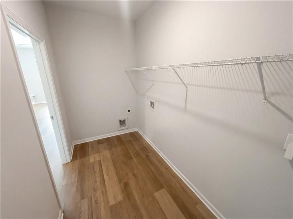 104 Charlie Fuller Road Grantville, GA 30220 - Photo 16 of 19 a view of a room with wooden floor