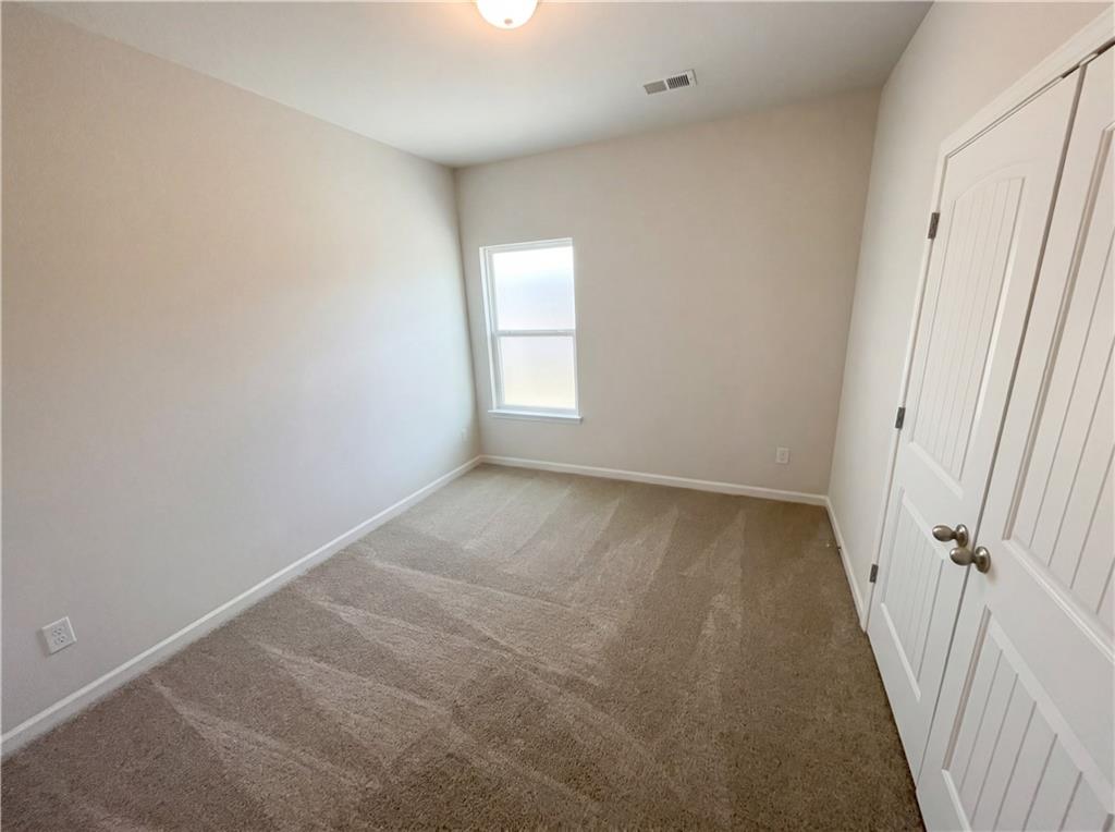 104 Charlie Fuller Road Grantville, GA 30220 - Photo 4 of 19 a view of room and window