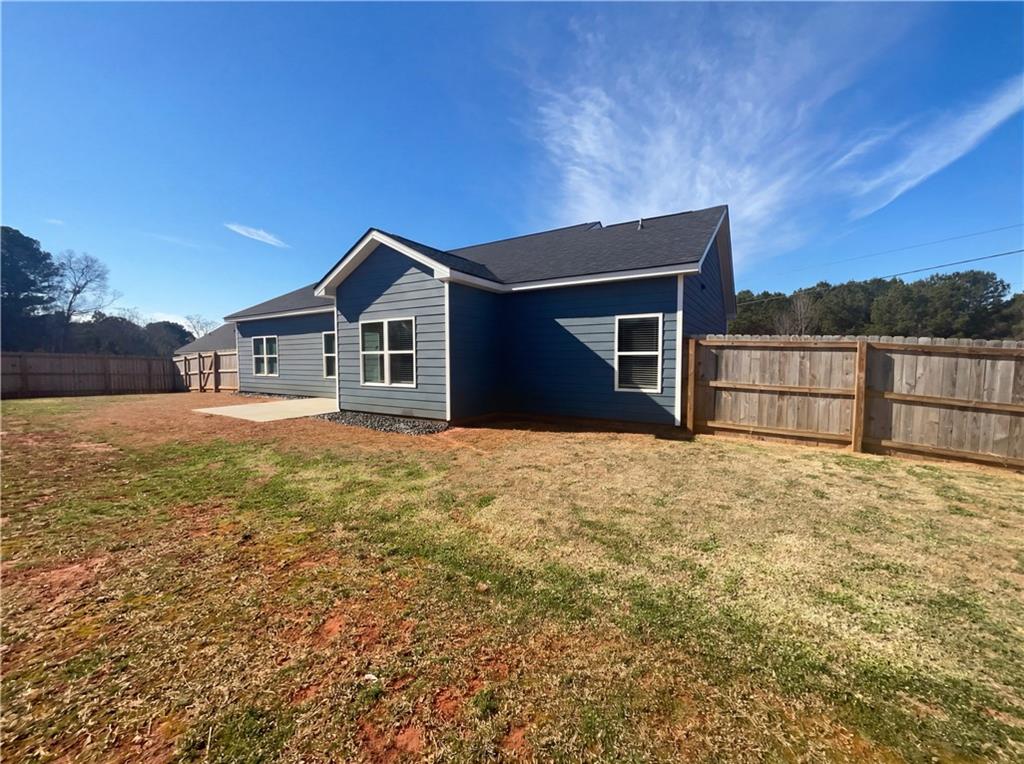 104 Charlie Fuller Road Grantville, GA 30220 - Photo 9 of 19 a house with a outdoor space