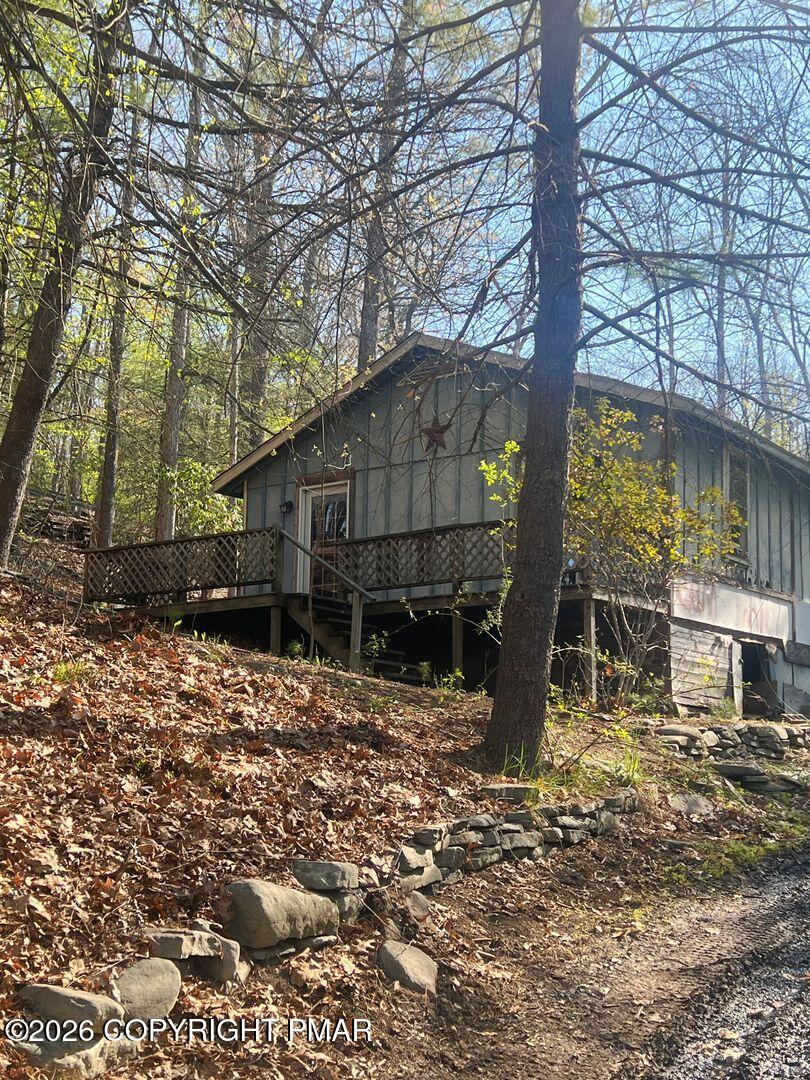 1214 Sugar Mountain Road West Bushkill, PA 18324 - Photo 1 of 9 a house view with a outdoor space