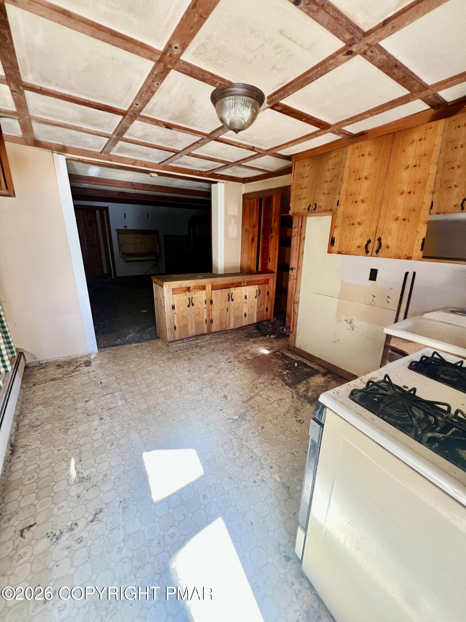 1214 Sugar Mountain Road West Bushkill, PA 18324 - Photo 5 of 9 a view of a room with wooden floor and furniture