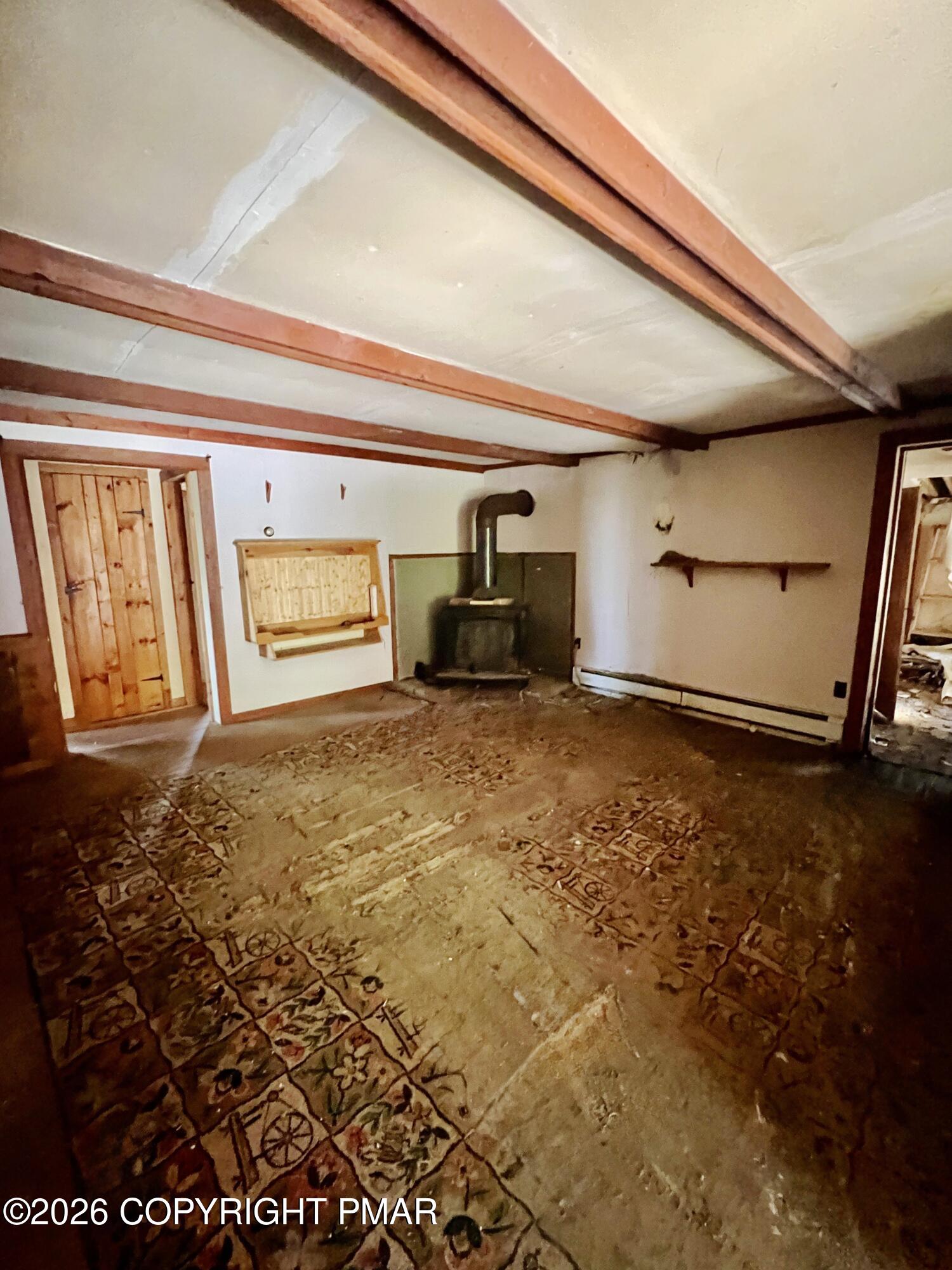 1214 Sugar Mountain Road West Bushkill, PA 18324 - Photo 7 of 9 a view of empty room with wooden floor
