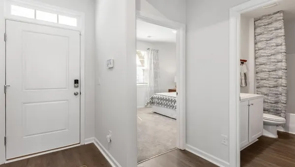 a view of a bathroom from the hallway