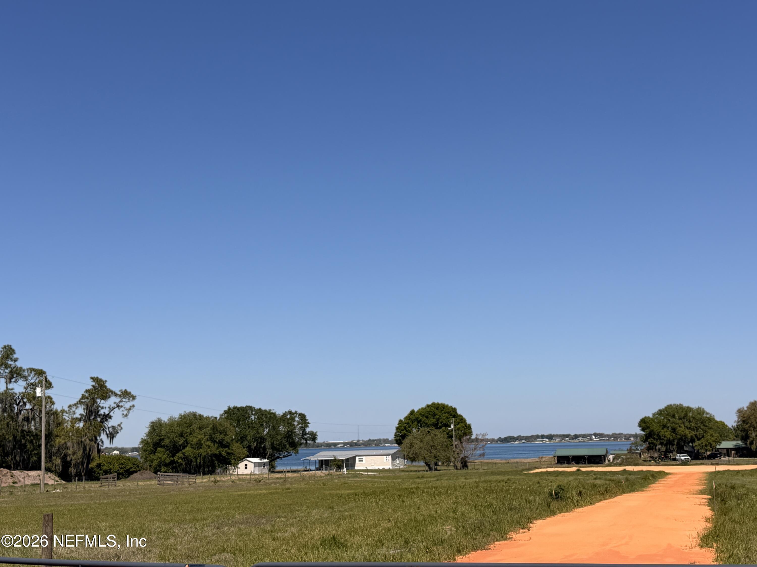 1360 Fort Meade Road Frostproof, FL 33843 - Photo 11 of 17 a view of a lake and outdoor space