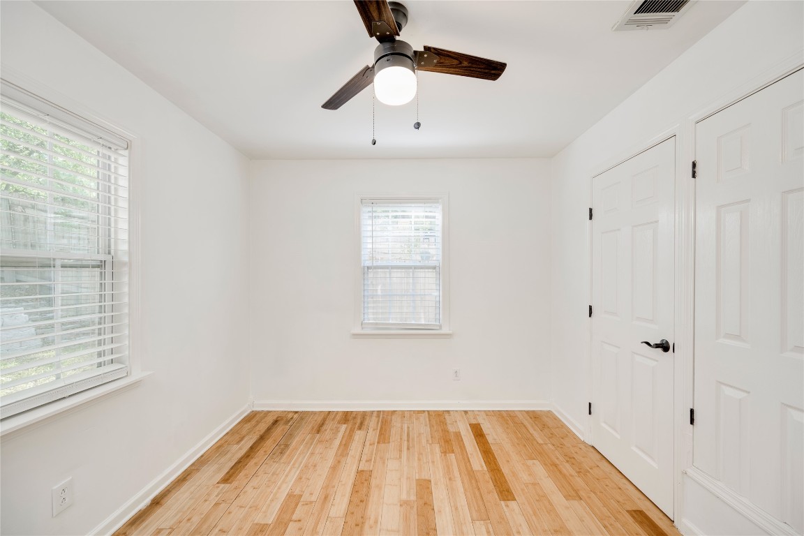 2903 South 5th Street Austin, TX 78704 - Photo 15 of 39 a view of a room with a ceiling fan and a window