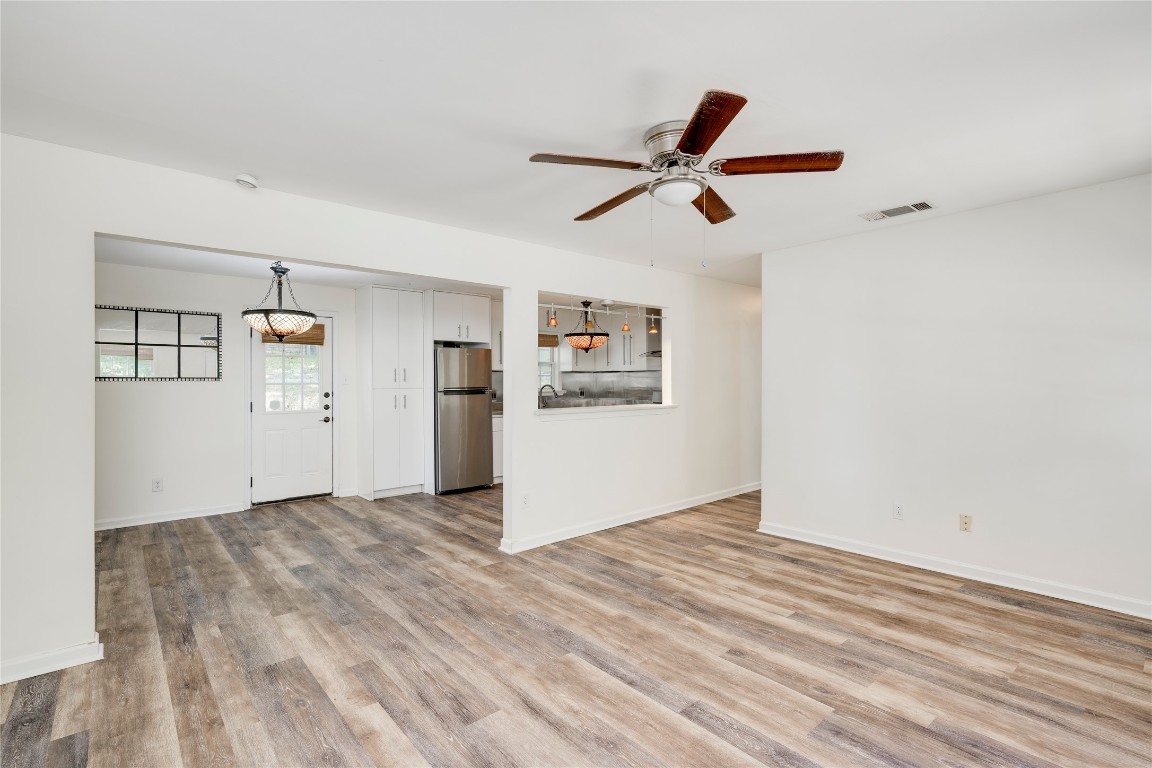 2903 South 5th Street Austin, TX 78704 - Photo 19 of 39 a view of empty room with wooden floor