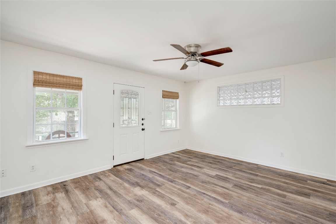 2903 South 5th Street Austin, TX 78704 - Photo 23 of 39 a view of empty room with wooden floor and fan