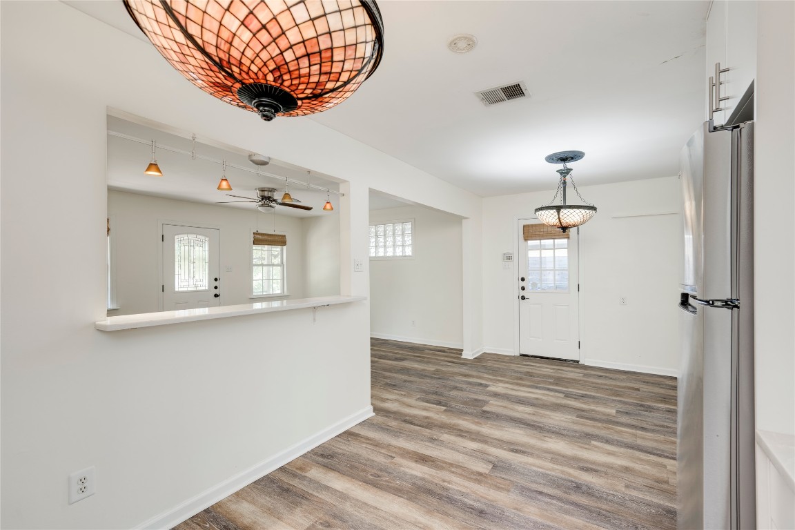 2903 South 5th Street Austin, TX 78704 - Photo 6 of 39 wooden floor in an empty room