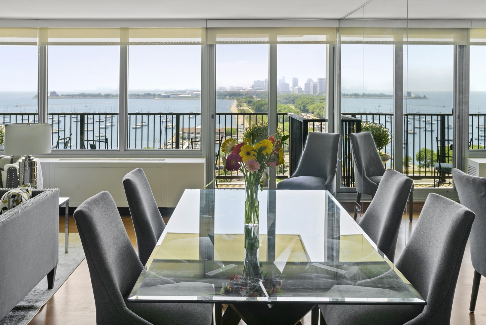 400 East Randolph Street, Unit 1403 Chicago, IL 60601 - Photo 4 of 17 a view of a dining room with furniture window and kitchen view