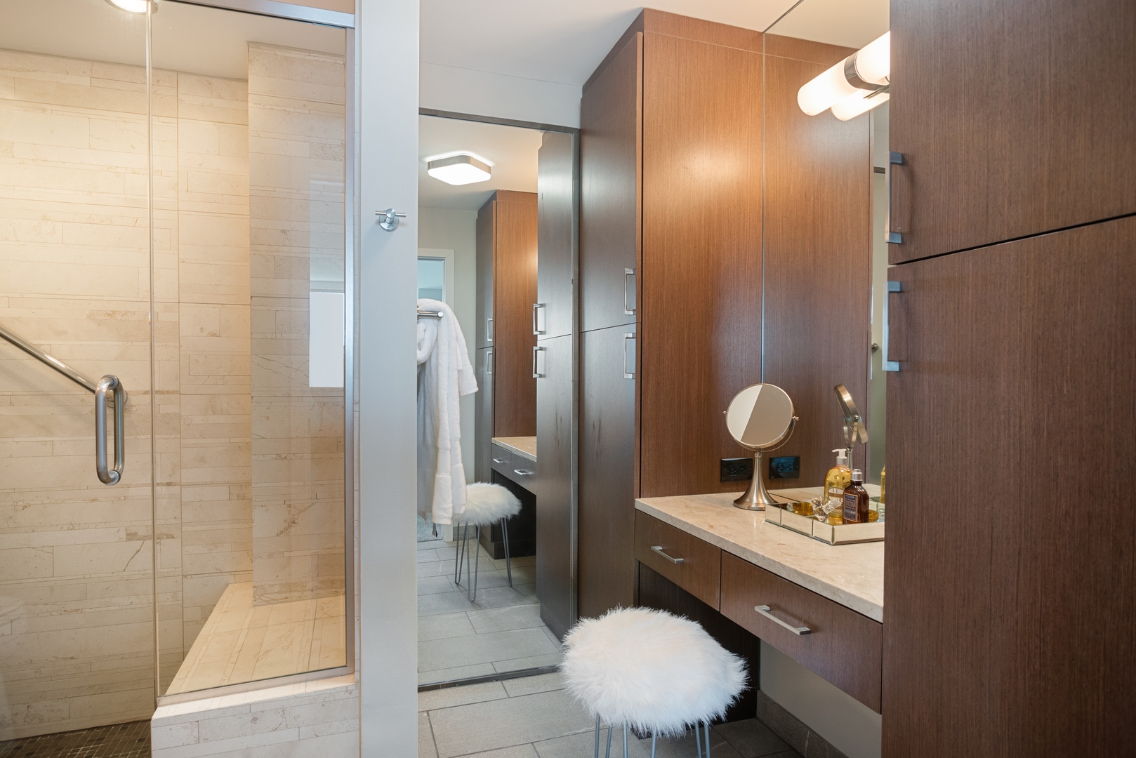 400 East Randolph Street, Unit 1403 Chicago, IL 60601 - Photo 9 of 17 a bathroom with a sink a toilet and shower