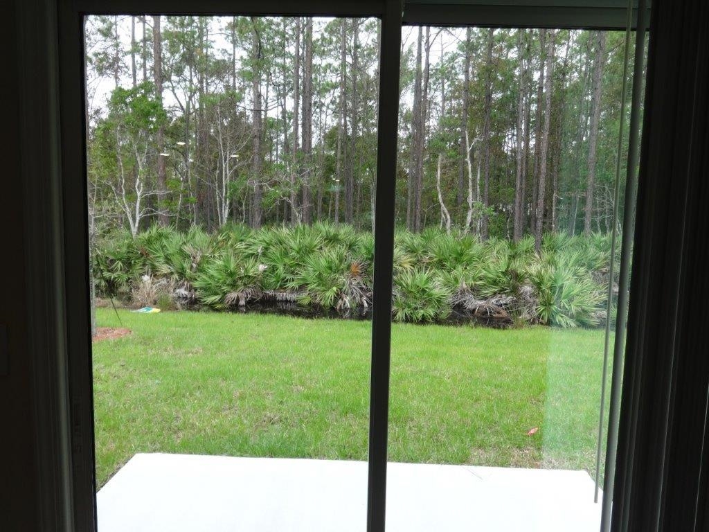382 Falcon Ridge Road St. Augustine, FL 32084 - Photo 6 of 21 a view of backyard from window