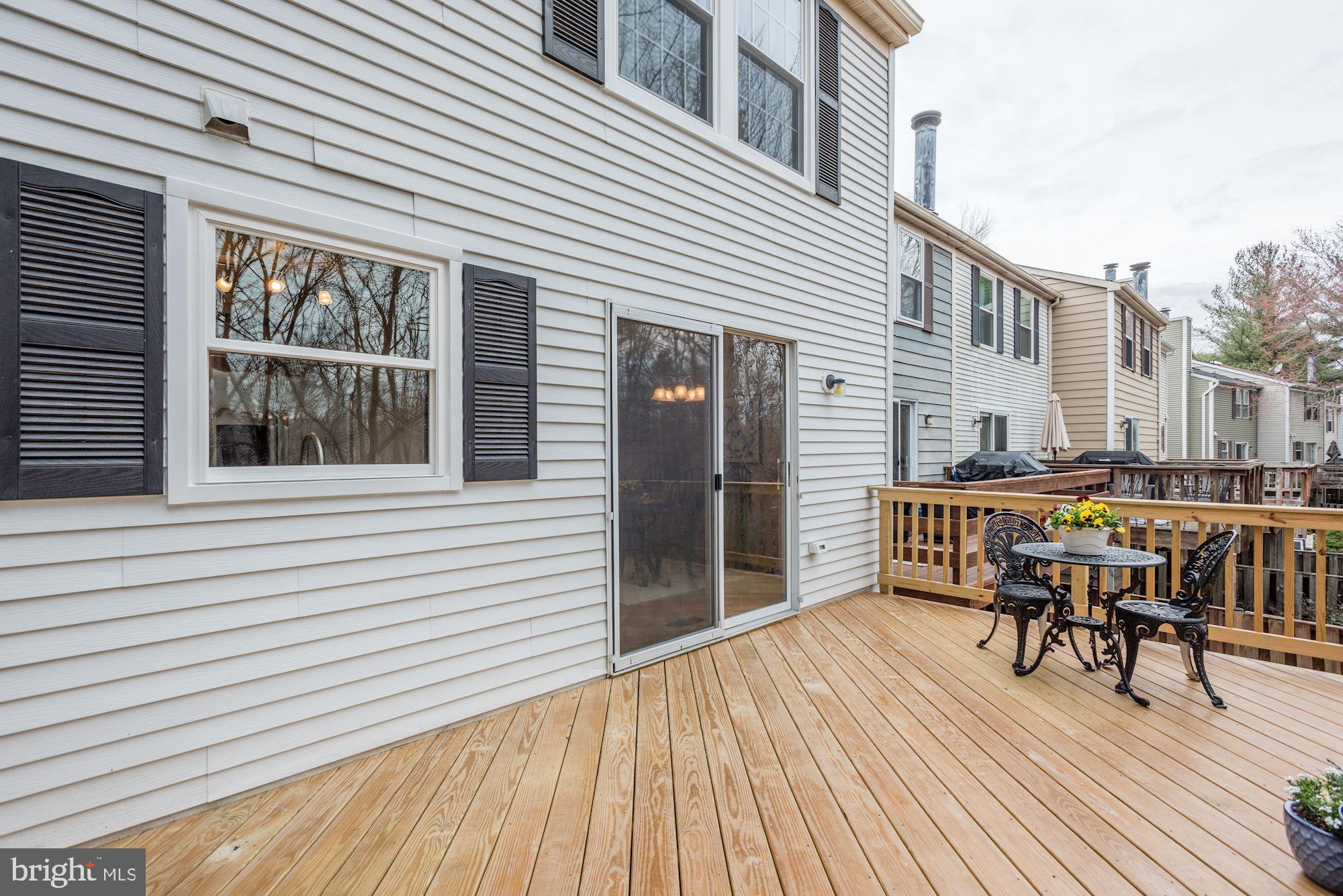 10968 Granby Court Reston, VA 20191 - Photo 14 of 33 a balcony with table and chairs