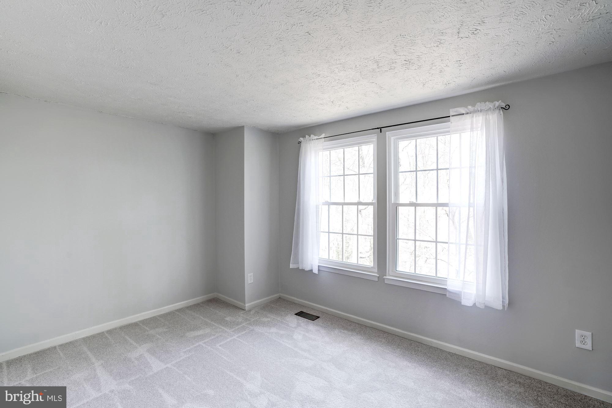 10968 Granby Court Reston, VA 20191 - Photo 16 of 33 an empty room with a window