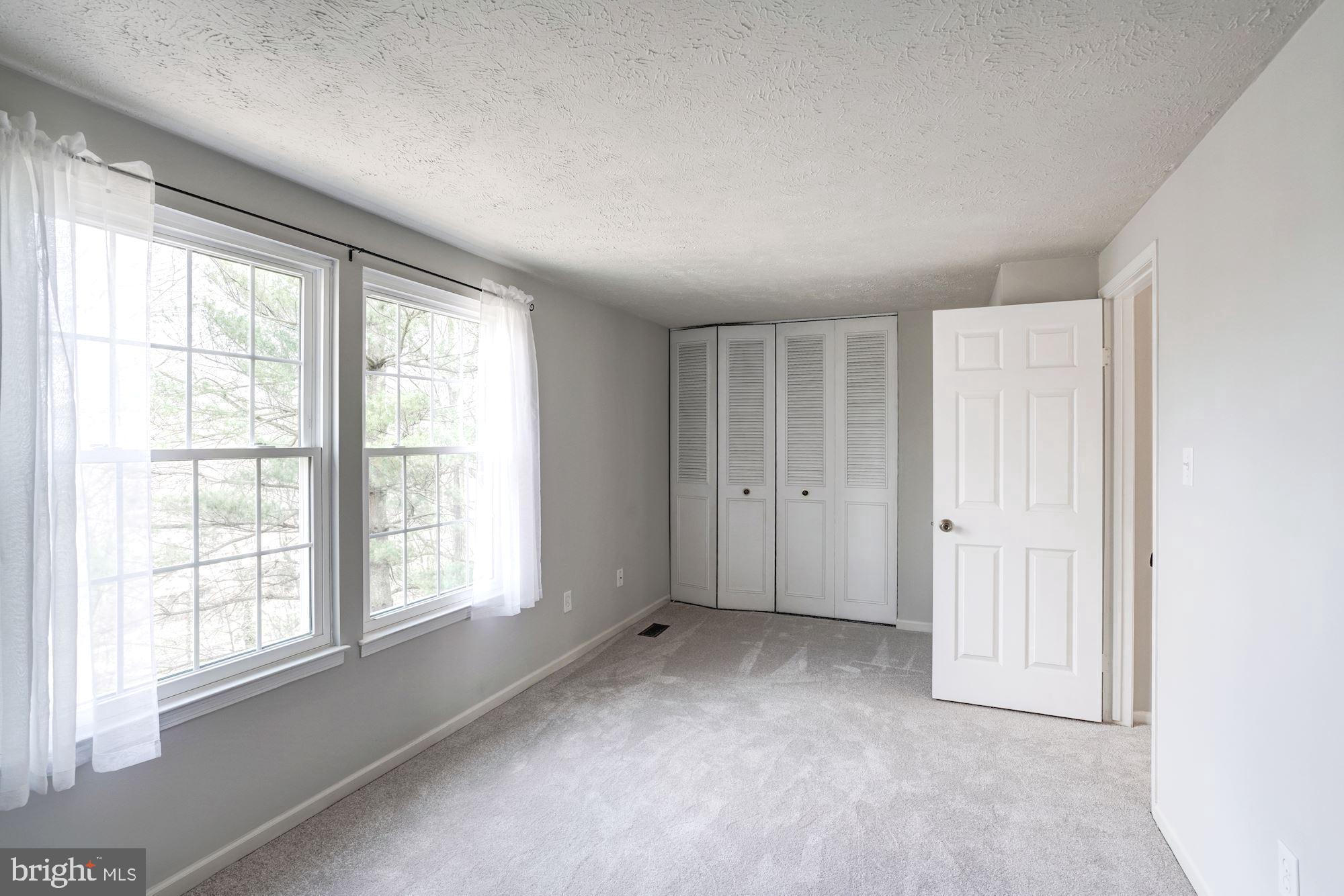 10968 Granby Court Reston, VA 20191 - Photo 17 of 33 an empty room with windows