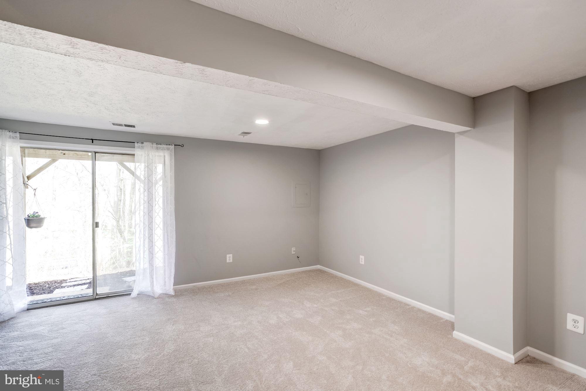 10968 Granby Court Reston, VA 20191 - Photo 27 of 33 an empty room with windows and closet