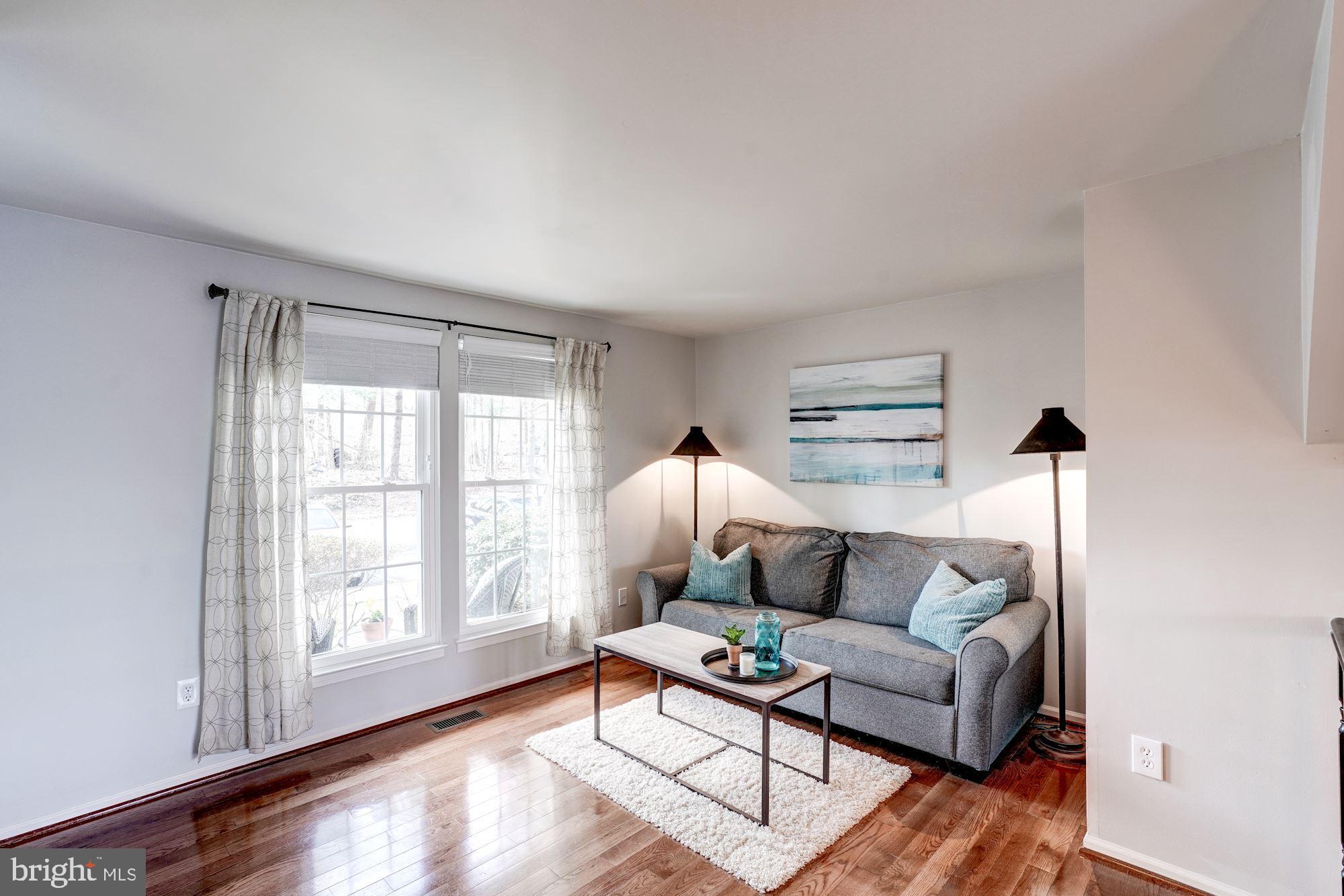 10968 Granby Court Reston, VA 20191 - Photo 4 of 33 a living room with furniture and a large window
