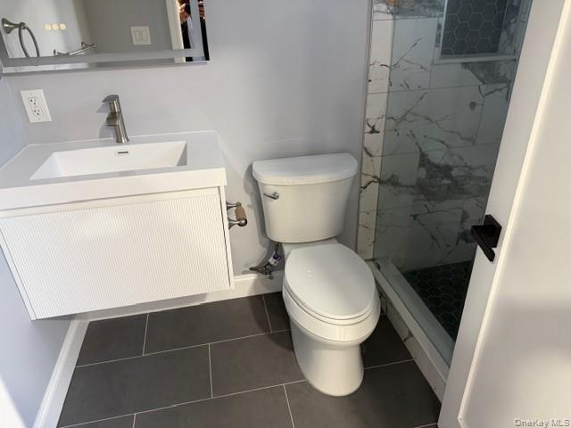 95 Muncie Road West Babylon, NY 11704 - Photo 6 of 13 a bathroom with a toilet and a sink