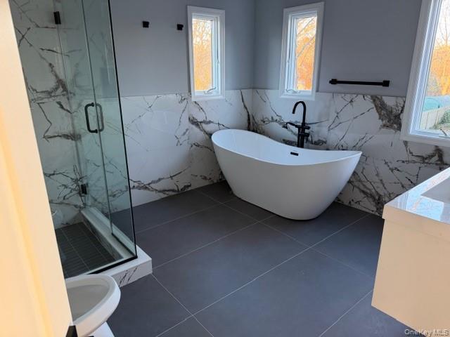 95 Muncie Road West Babylon, NY 11704 - Photo 10 of 13 a bathroom with a bathtub and shower